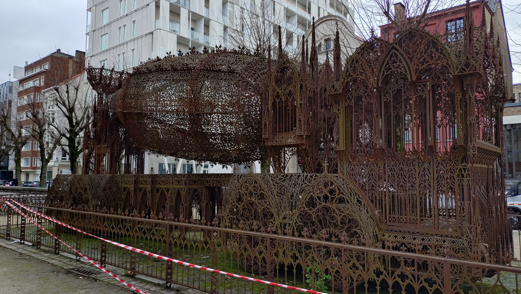 Art - a large rusty-coloured metal framework art of a concrete truck