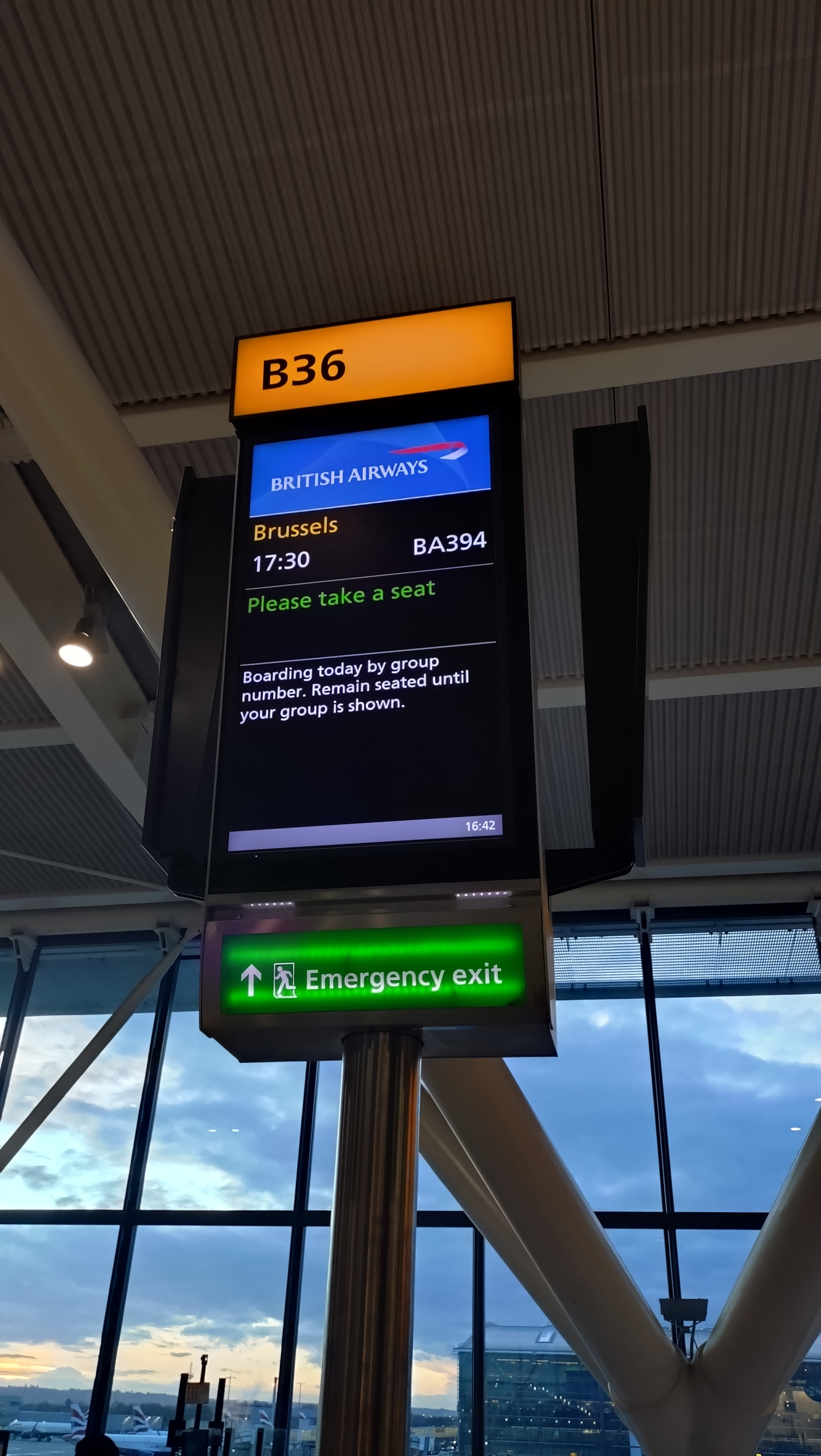 Heathrow Terminal 5 gate B36 sign showing BA394 to Brussels leaving soon&10;